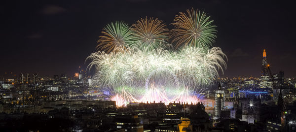 Firework display at night