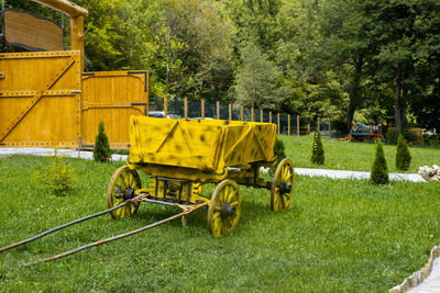 Yellow cart on field