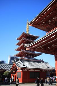 Low angle view of building against blue sky