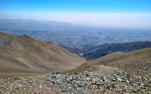 Scenic view of arid landscape against sky