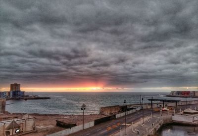 Scenic view of sea against cloudy sky