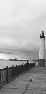 Pier over sea against sky