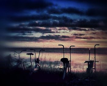 Scenic view of landscape against cloudy sky