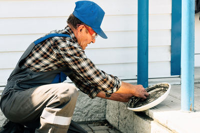 Side view of man working