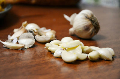 Close-up of garlic on cutting board