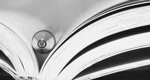 Macro photography of a book with a pen