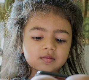 Close-up portrait of cute girl