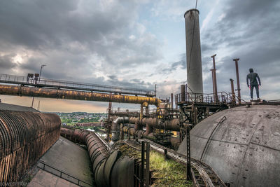 Panoramic view of factory against sky