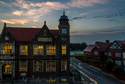 View of illuminated tower at dusk