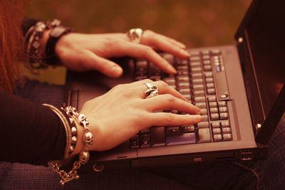 Close-up of woman using mobile phone