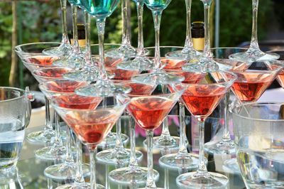 Close-up of wine glasses on table