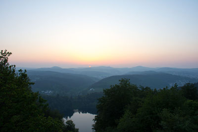 Scenic view of mountains against sky during sunset