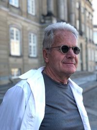 Portrait of mature man standing outdoors