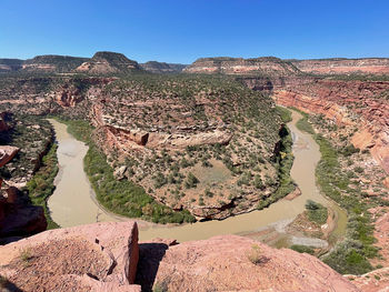 Aerial view of rock formations against sky