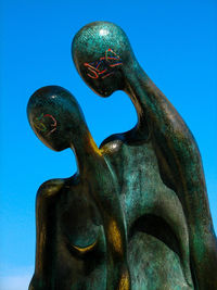 Low angle view of statue against sky