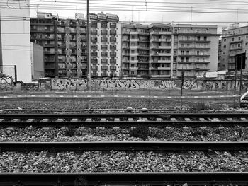 Railway tracks against buildings