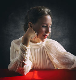 Portrait of woman with pleated white blouse vi