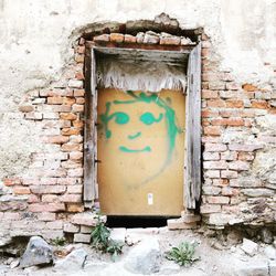 Graffiti on brick wall