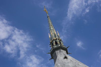 Low angle view of built structure against blue sky