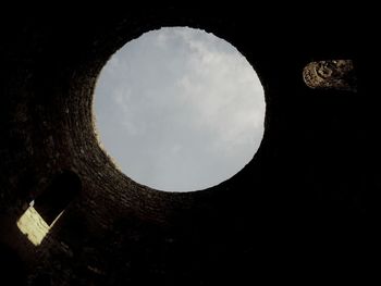 Close-up of silhouette structure against sky