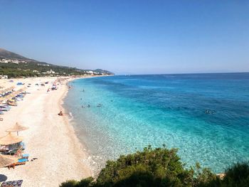 Scenic view of sea against clear blue sky