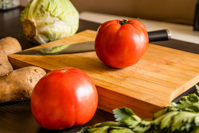 High angle view of vegetables on cutting board