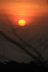 Scenic view of dramatic sky during sunset