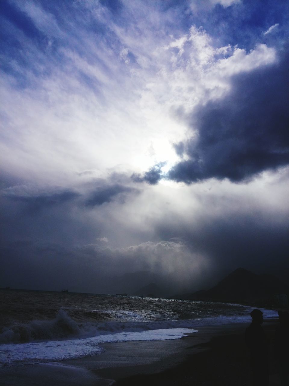 sea, sky, water, cloud - sky, scenics, beauty in nature, beach, tranquil scene, cloudy, tranquility, horizon over water, nature, shore, weather, cloud, idyllic, wave, overcast, storm cloud, outdoors