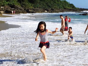 Portrait of a boy playing at beach