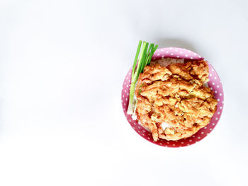 High angle view of bread on white background