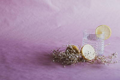 Close-up of fruit on glass table