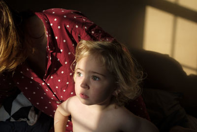 Girl with mother at home