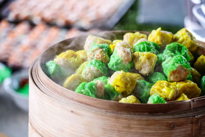 Close-up of vegetables in basket on table