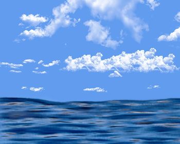 Scenic view of sea against blue sky