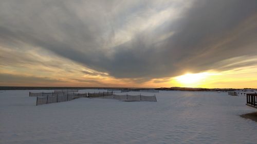 Scenic view of sea at sunset