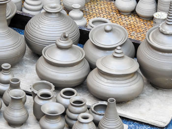 High angle view of earthenware for sale at workshop