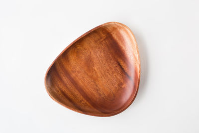 High angle view of bread against white background