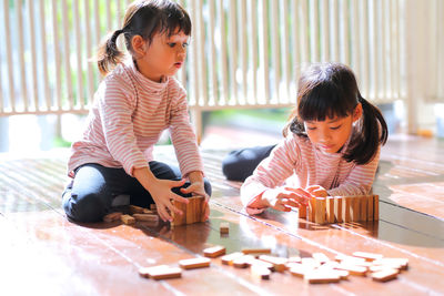 Cute girl playing with toy