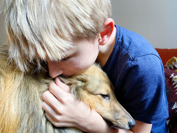 High angle view of boy with dog