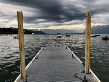 Pier over sea against sky