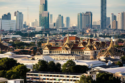 High angle view of buildings in city against sky