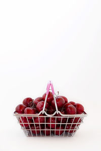 Close-up of fruits against white background
