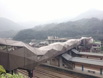 Houses on mountain range