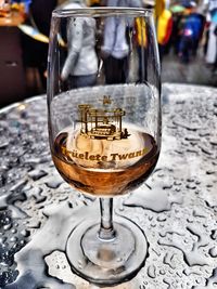 Close-up of wine glass on table