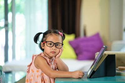 Portrait of cute girl at home