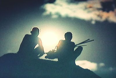 Silhouette of man with guitar