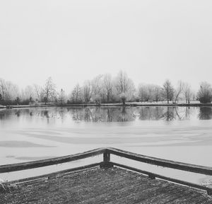 Scenic view of frozen lake against clear sky