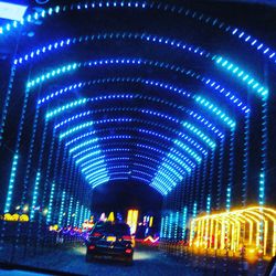 Illuminated lights on road at night