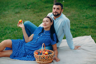 Young couple kissing in basket