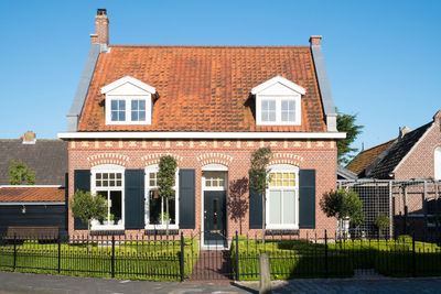 Residential building against blue sky